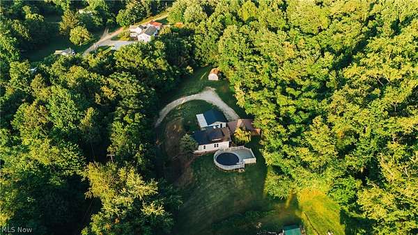 9 Acres of Land with Home for Auction in Coshocton, Ohio