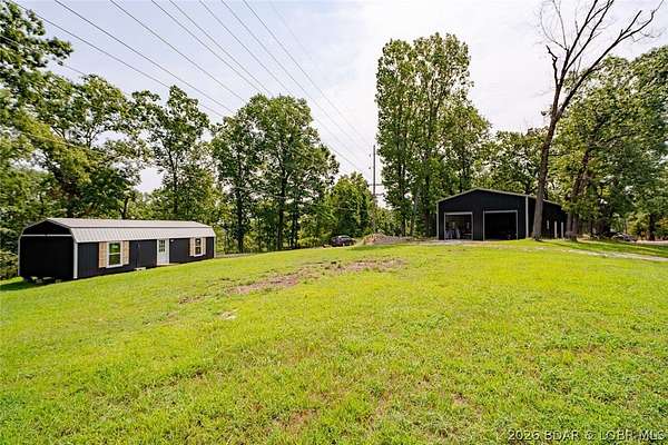 6.4 Acres of Land with Home for Sale in Eldon, Missouri