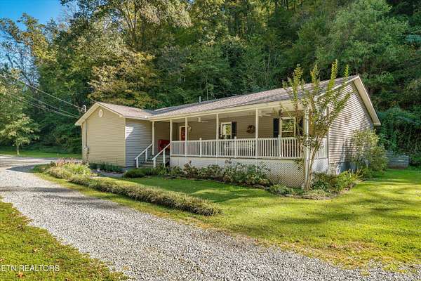 7.89 Acres of Land with Home for Sale in Seymour, Tennessee