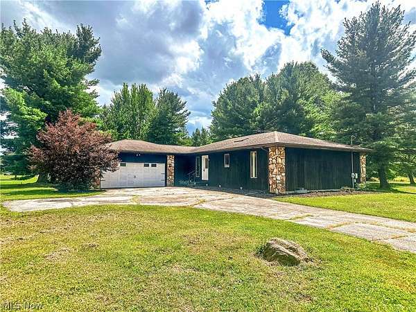 9.57 Acres of Land with Home for Sale in Bristolville, Ohio