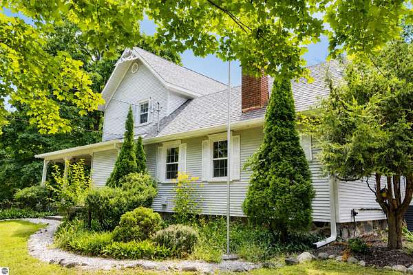 12.4 Acres of Land with Home for Sale in Williamsburg, Michigan