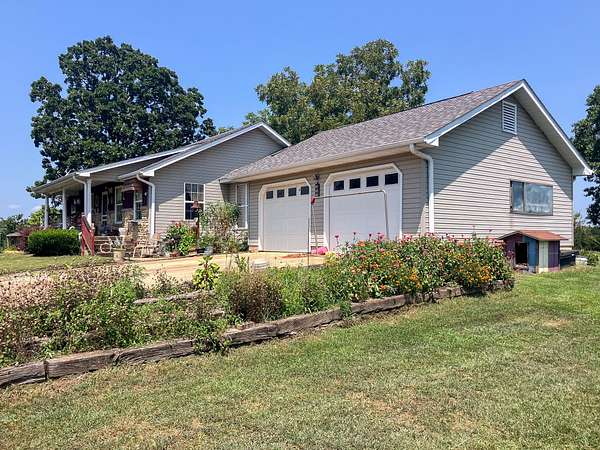 87 Acres of Land with Home for Sale in Birch Tree, Missouri