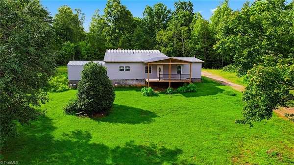 7 Acres of Land with Home for Sale in Boomer, North Carolina