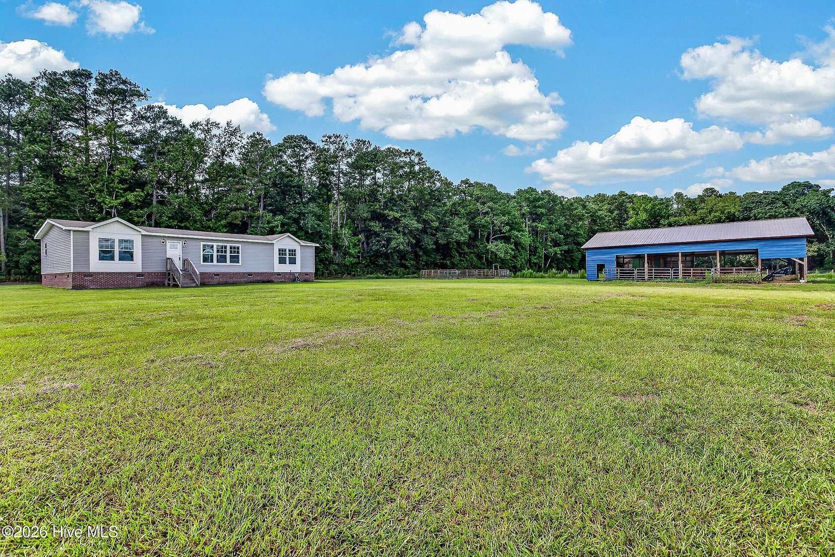 11.2 Acres of Land with Home for Sale in Wallace, North Carolina