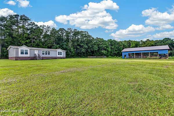 11.2 Acres of Land with Home for Sale in Wallace, North Carolina