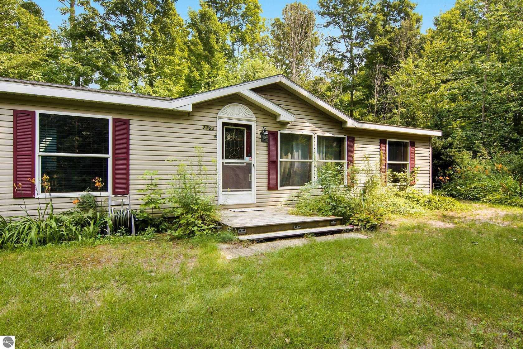 3.53 Acres of Land with Home for Sale in Interlochen, Michigan