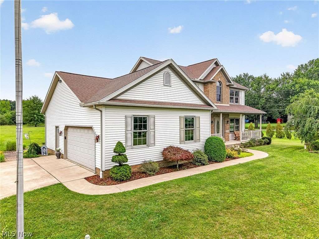 5.19 Acres of Land with Home for Sale in Louisville, Ohio