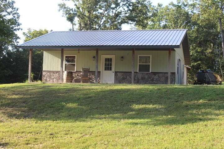 10.6 Acres of Land with Home for Sale in Gainesville, Missouri