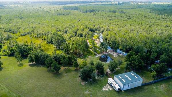 25 Acres of Recreational Land with Home for Sale in Naylor, Georgia