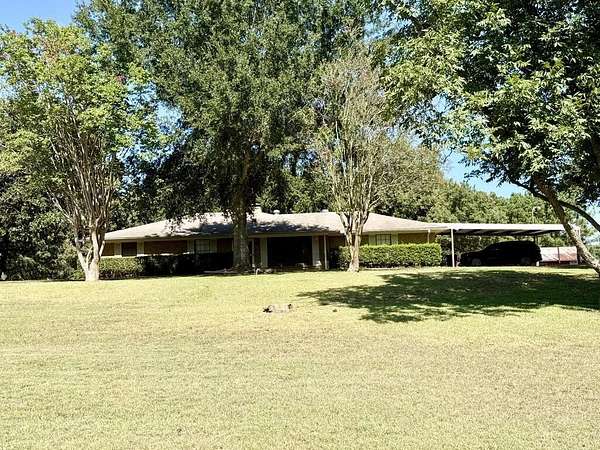 6.17 Acres of Land with Home for Sale in Grapeland, Texas