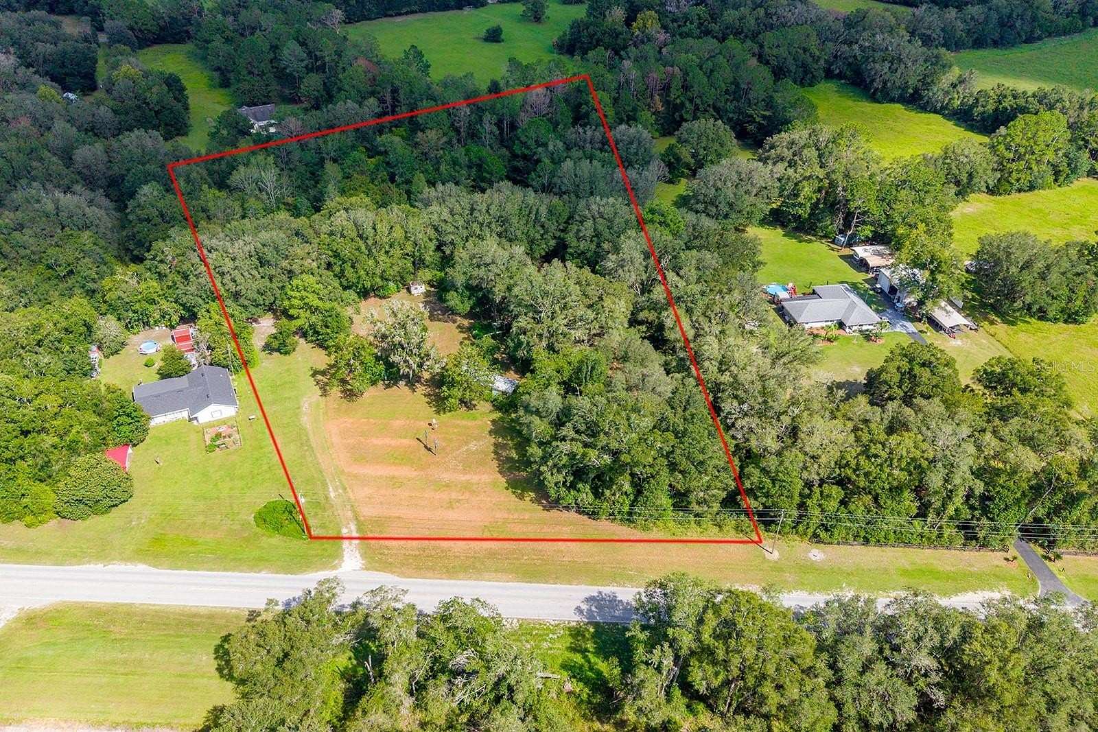 5.27 Acres of Land with Home for Sale in Alachua, Florida