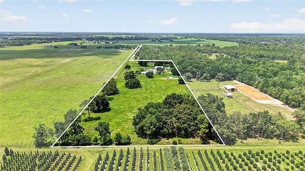 10.2 Acres of Land with Home for Sale in Morriston, Florida