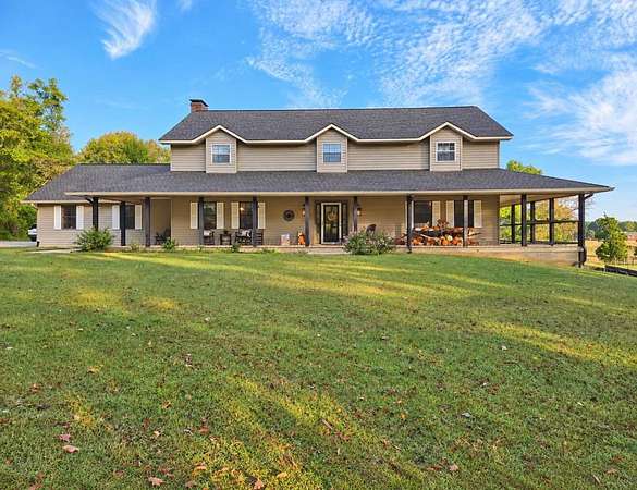 19 Acres of Land with Home for Sale in Falkville, Alabama