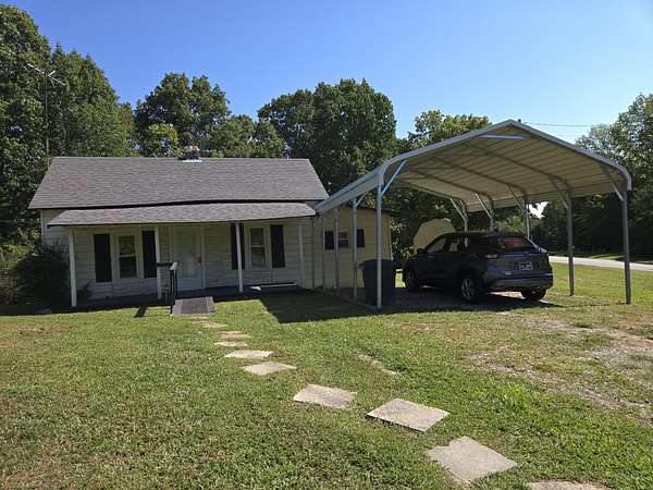 0.97 Acres of Land with Home for Sale in Woodlawn, Tennessee