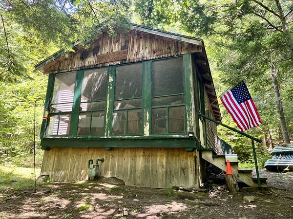 1.4 Acres of Land with Home for Sale in West Paris, Maine
