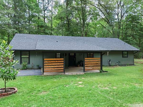 2.8 Acres of Land with Home for Sale in Avinger, Texas
