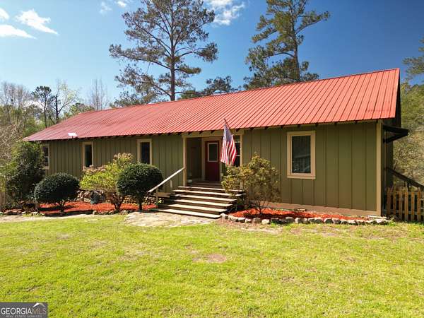 1.5 Acres of Land with Home for Sale in Irwinton, Georgia