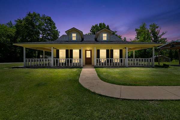 10.9 Acres of Land with Home for Sale in Winona, Texas