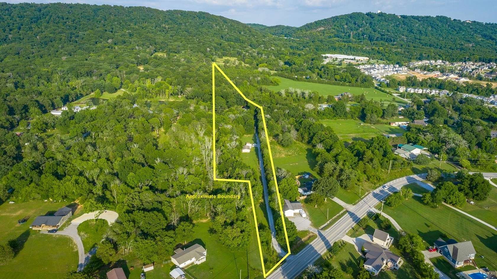 10.2 Acres of Land with Home for Sale in Ooltewah, Tennessee