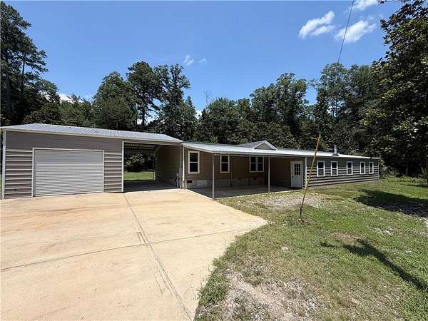 5 Acres of Land with Home for Sale in Pittsview, Alabama