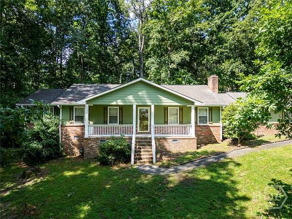 3.83 Acres of Land with Home for Sale in Lawrenceville, Georgia