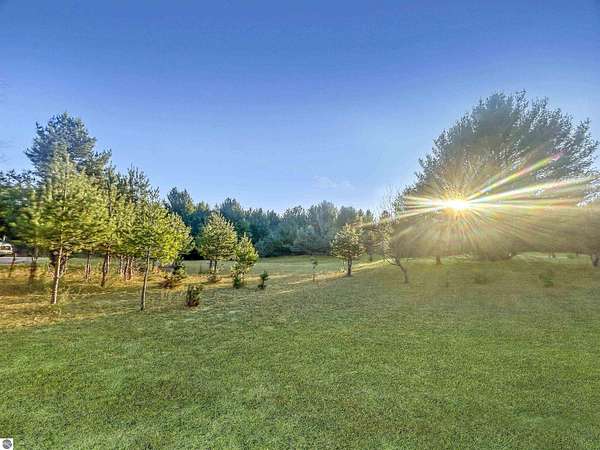 2 Acres of Residential Land for Sale in Williamsburg, Michigan