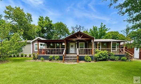 1.86 Acres of Land with Home for Sale in Atlanta, Texas