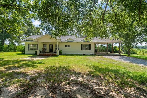 1.69 Acres of Land with Home for Sale in Moselle, Mississippi