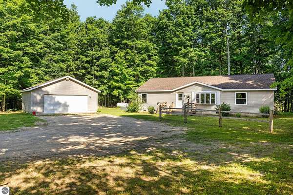 5 Acres of Land with Home for Sale in Traverse City, Michigan