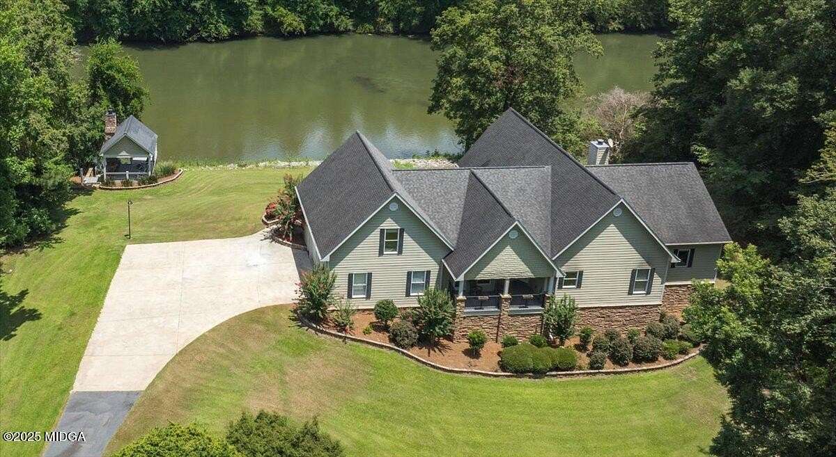 9.24 Acres of Land with Home for Sale in Juliette, Georgia