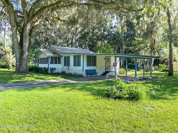 1.55 Acres of Land with Home for Sale in San Mateo, Florida