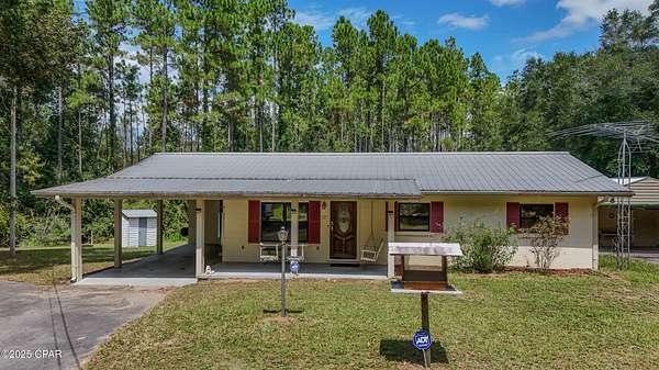7.36 Acres of Land with Home for Sale in Chipley, Florida