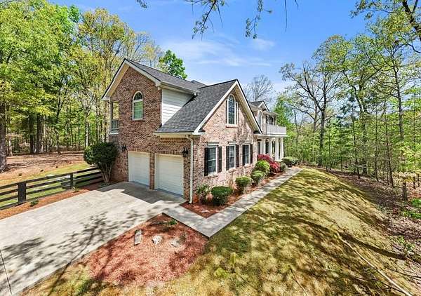 3.32 Acres of Land with Home for Sale in Marblehill, Georgia