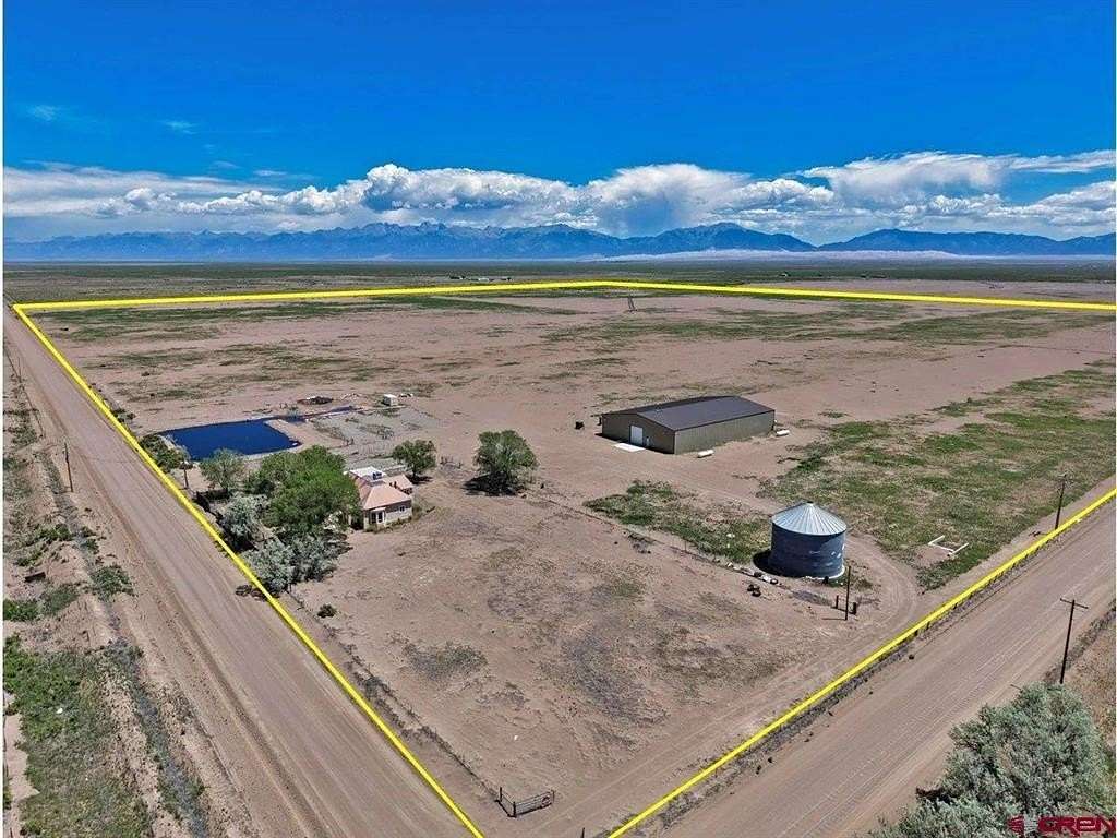 160 Acres of Agricultural Land with Home for Sale in Mosca, Colorado