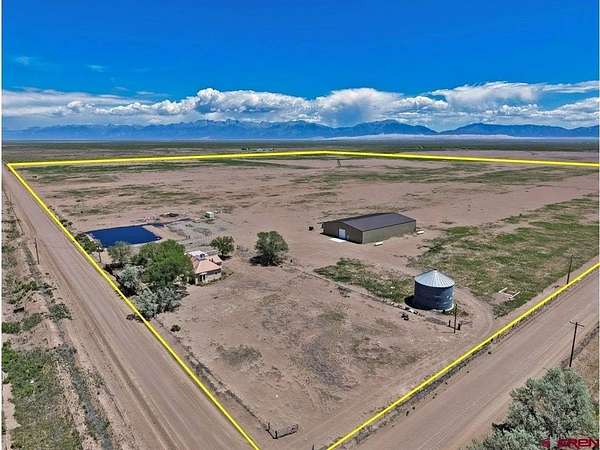 160 Acres of Agricultural Land with Home for Sale in Mosca, Colorado