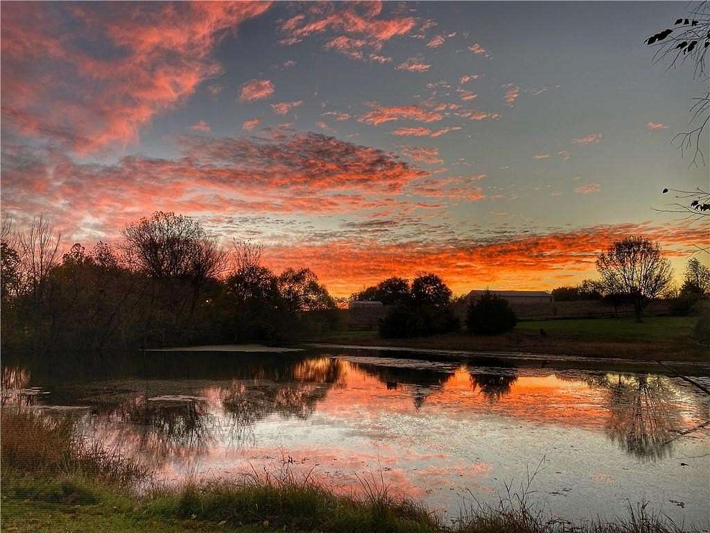 5 Acres of Land with Home for Sale in Peculiar, Missouri
