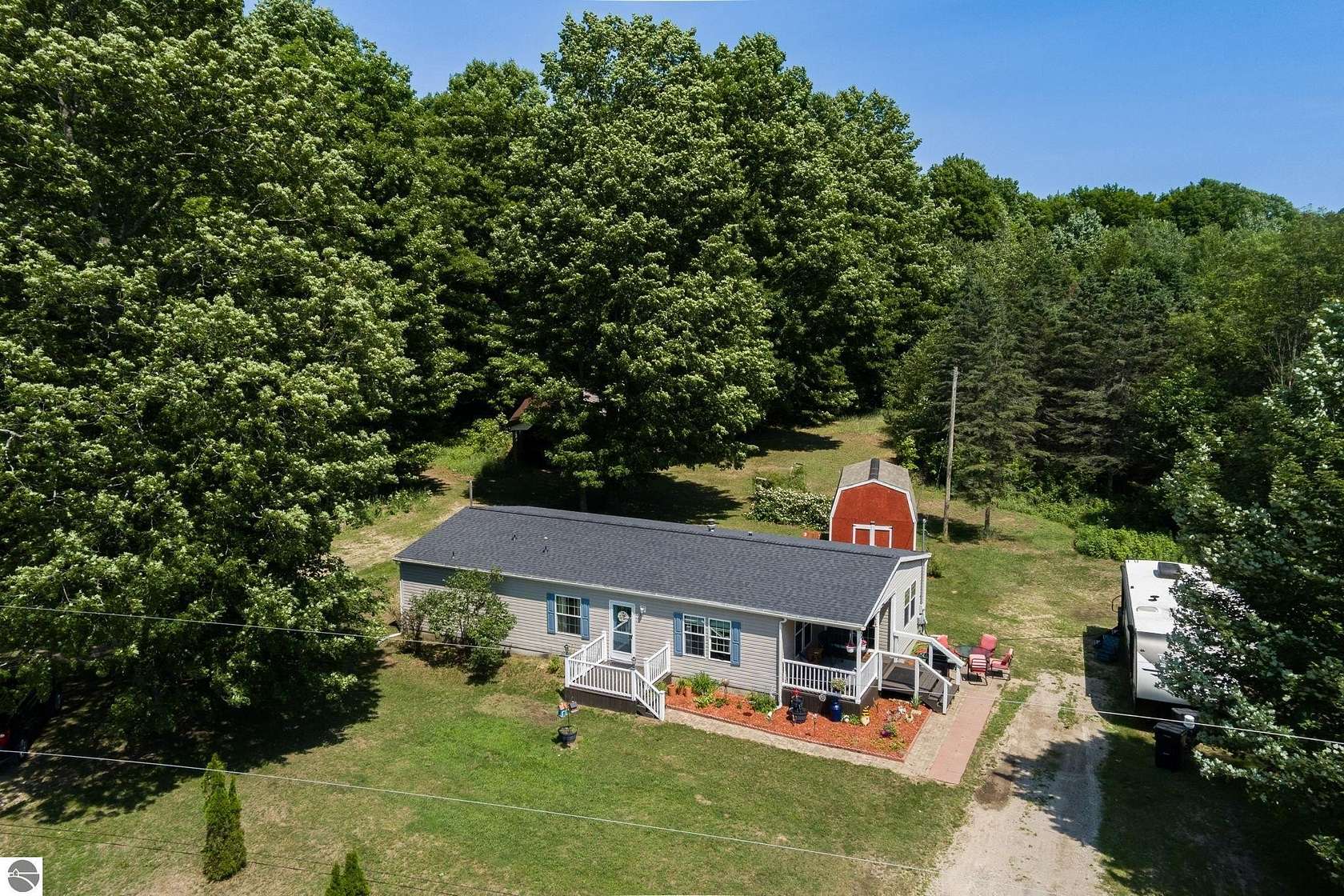 5 Acres of Land with Home for Sale in Beulah, Michigan
