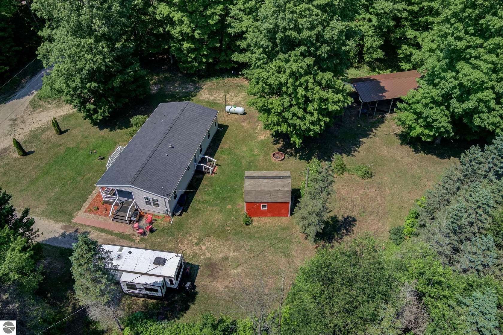 5 Acres of Land with Home for Sale in Beulah, Michigan