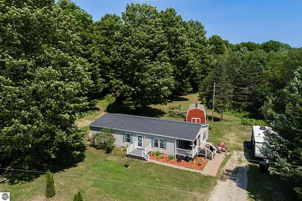 5 Acres of Land with Home for Sale in Beulah, Michigan
