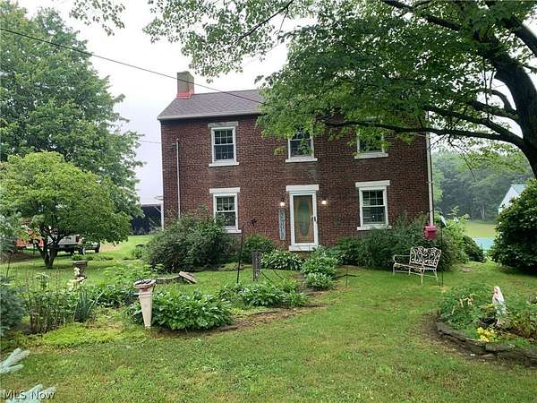6.13 Acres of Land with Home for Auction in Rogers, Ohio