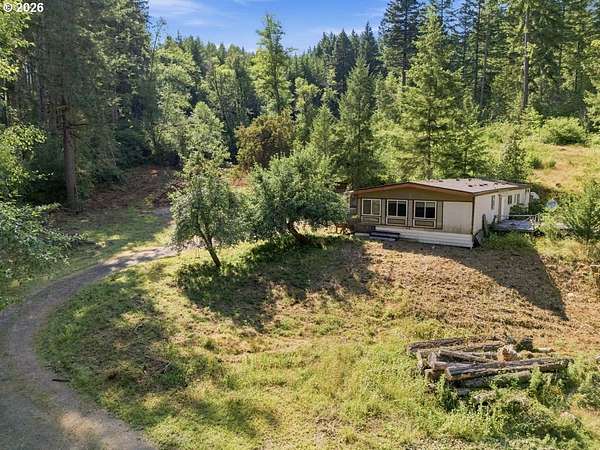 5.82 Acres of Land with Home for Sale in Noti, Oregon