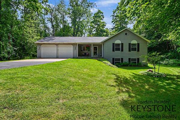 1.67 Acres of Land with Home for Sale in Lowell, Michigan