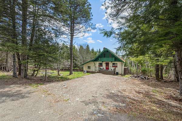 1.78 Acres of Land with Home for Sale in Rangeley, Maine