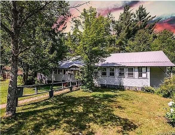 5.76 Acres of Land with Home for Sale in North Elba Town, New York