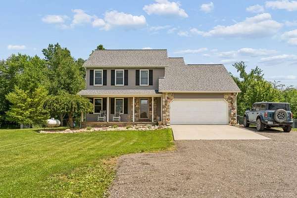 5 Acres of Land with Home for Sale in Imlay City, Michigan