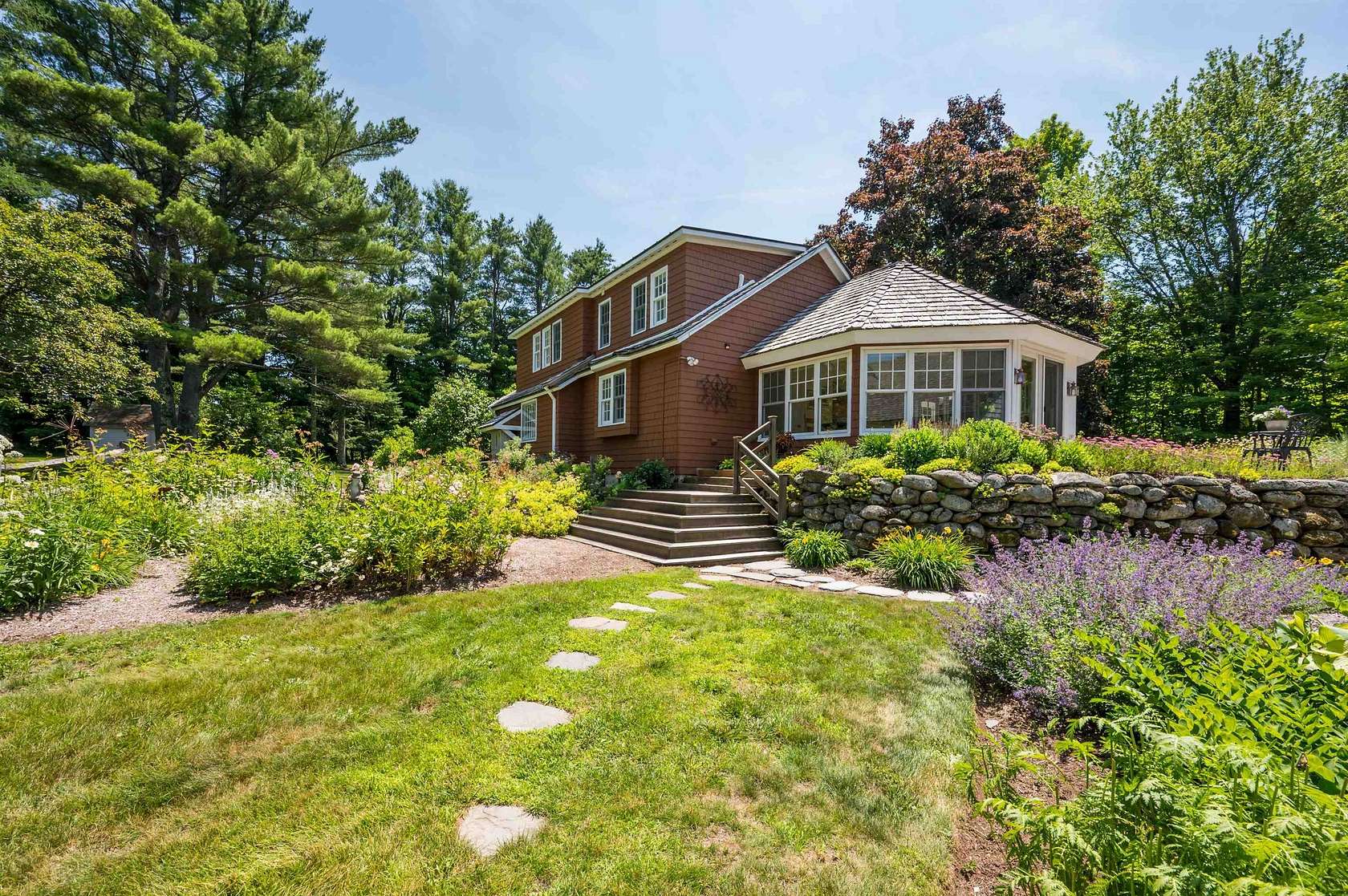 5.1 Acres of Land with Home for Sale in New London, New Hampshire