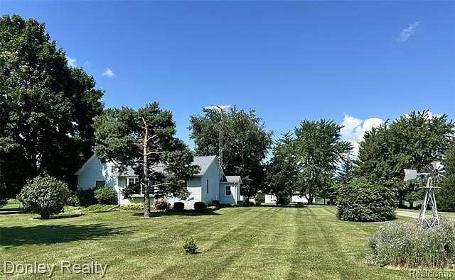 1.5 Acres of Land with Home for Sale in Moore Township, Michigan
