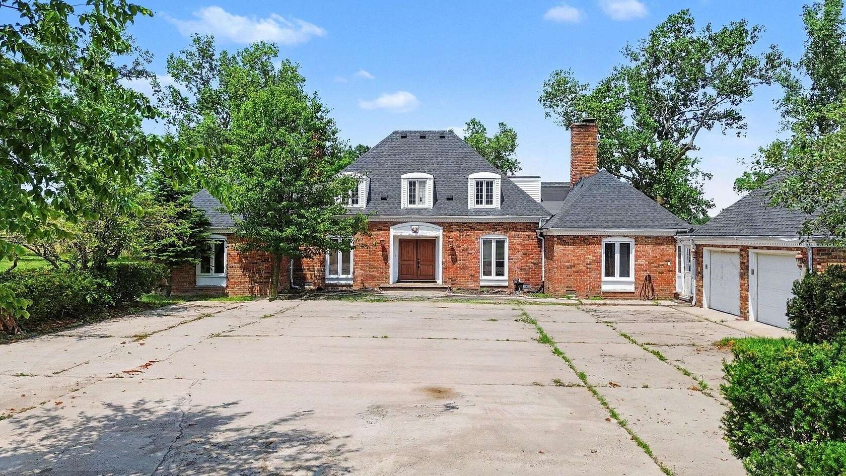 70.9 Acres of Agricultural Land with Home for Sale in Milan, Michigan