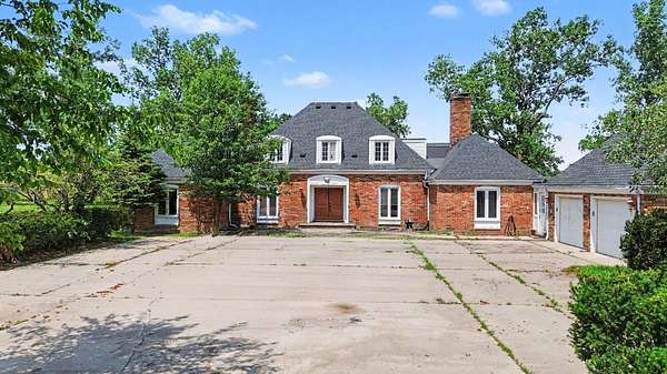 70.9 Acres of Agricultural Land with Home for Sale in Milan, Michigan