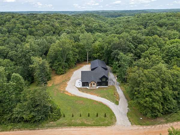 15.7 Acres of Recreational Land with Home for Sale in Dickson, Tennessee